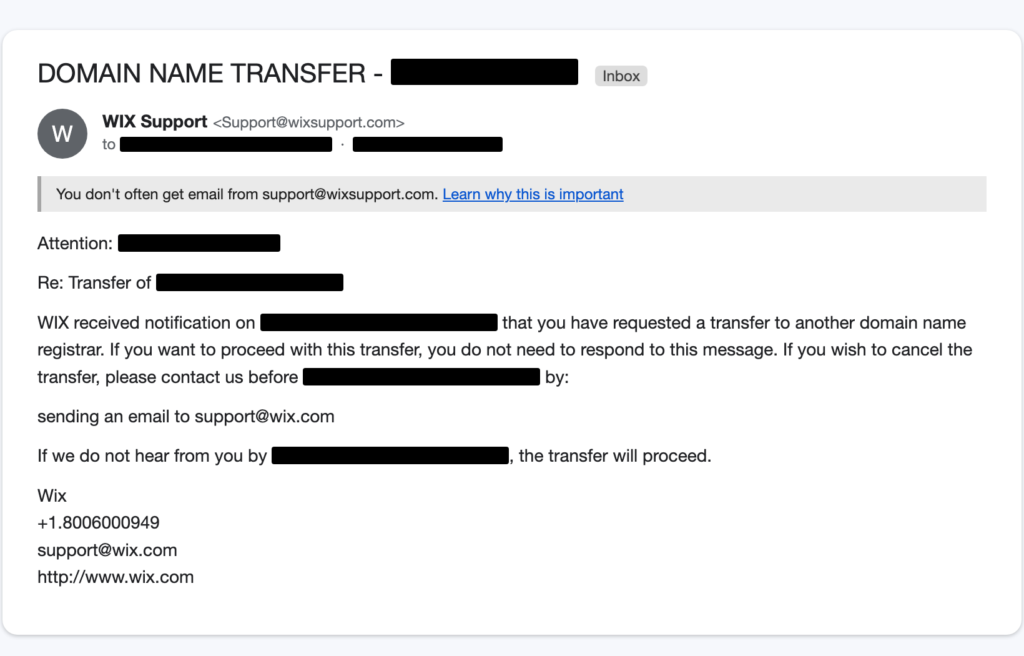 Redacted screenshot of an email claiming to be a Wix domain transfer notification, warning that a domain transfer will proceed unless action is taken.